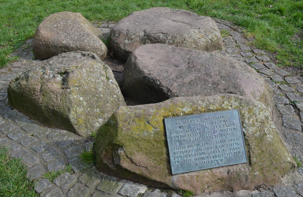Wash stones Knighton near footbridge over the brook channel for flood relief
