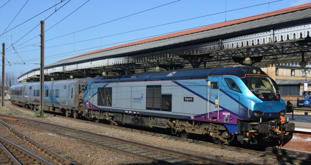Class 68 diesel-electric locomotive 68025 Superb, at York Station with a TransPennine service to Liverpool Lime Street station (March 2022)