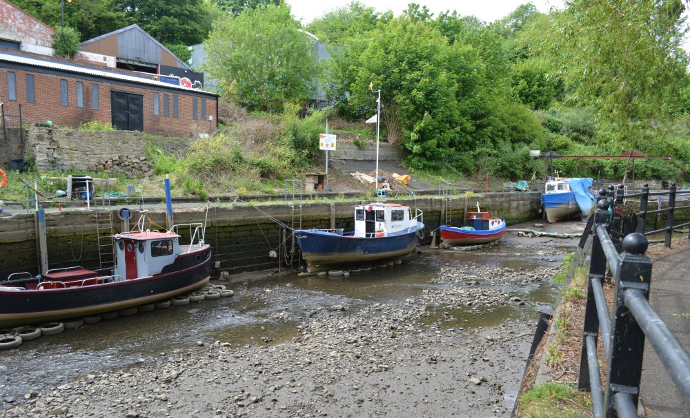 Small boats moored up on the quayside of the Ouseburn, Newcastle
