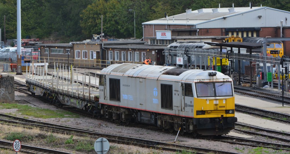 Class 60 diesel-electric locomotive 60099 in the Leicester yard of UK Rail Leasing, engages shunting a rake of sleeper wagons for track maintenance at Leicester Station (26/09/2022)