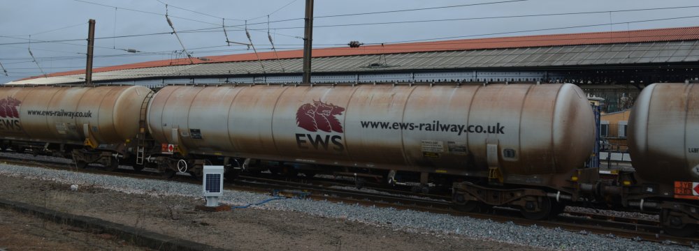 The oil tank wagons of the Lindsay Oil Refinery freight trains still have their original EWS livery!