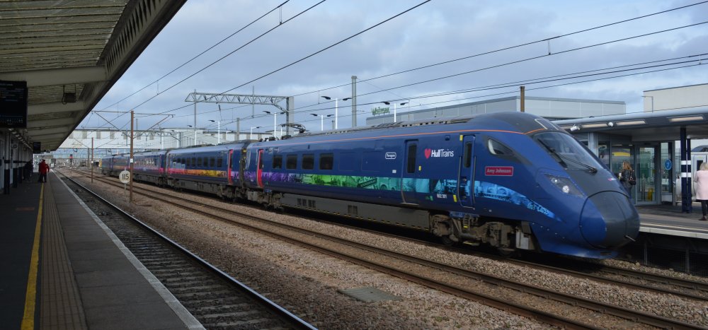 Bi-mode Sub-class 802/3 Class 802 802301 passing through Peterborough station with a non-stop Hull Trains service from Hull to Kings Cross, London station (February 24th 2023) trainspotting Peterborough station