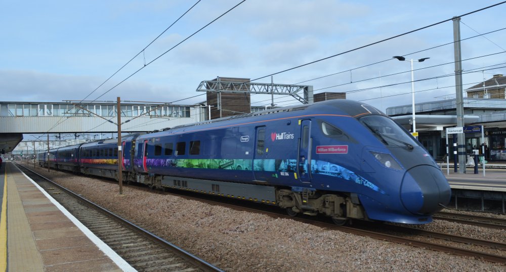 Trainspotting at Peterborough Bi-mode Class 802 train passing north through Peterborough station with a non-stop Hull Trains service from Kings Cross, London to Hull Paragon station trainspotting Peterborough station