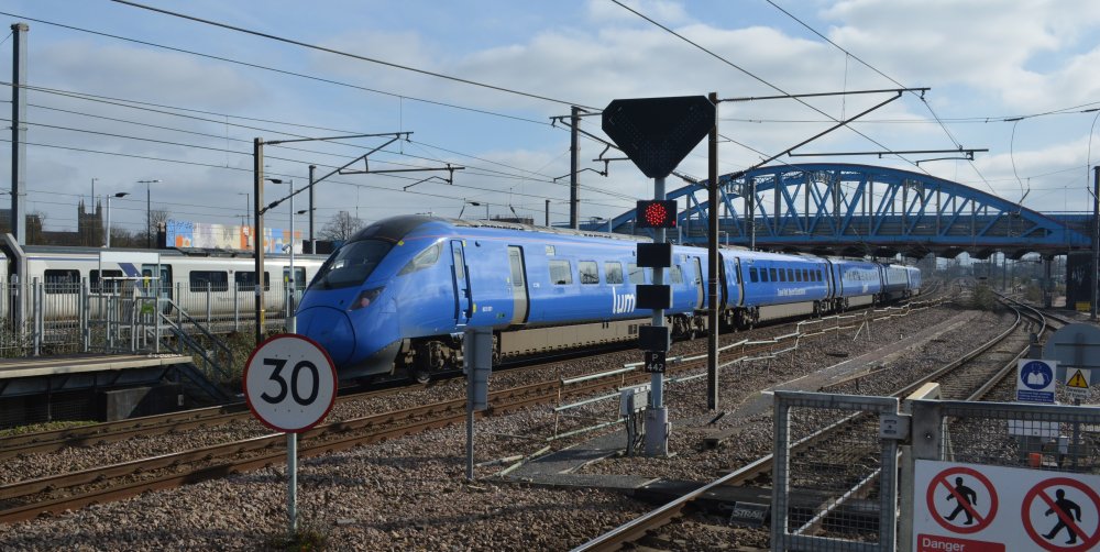 trainspotting Peterborough EMU Class 803 803001 lumo service from Edinburgh to London Kings Cross, heading south from Peterborough station (February 2023) trainspotting Peterborough station