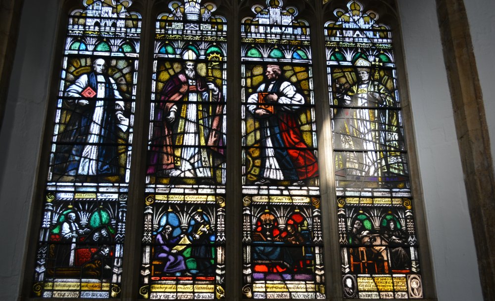 Details of the east stained glass window in the chancel of the church of St John the Baptist. Peterborough