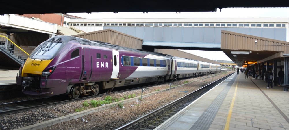 In the latest livery, DMUE Class 222 unit 222018 with an EMR London St Pancras to Sheffield service standing Leicester station (March 2023)