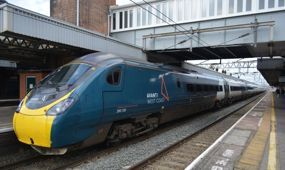 trainspotting at Nuneaton station Class 390 express EMU unit 390130 stopping at Nuneaton station with a London Euston to Manchester Piccadilly Avanti West Coast train service