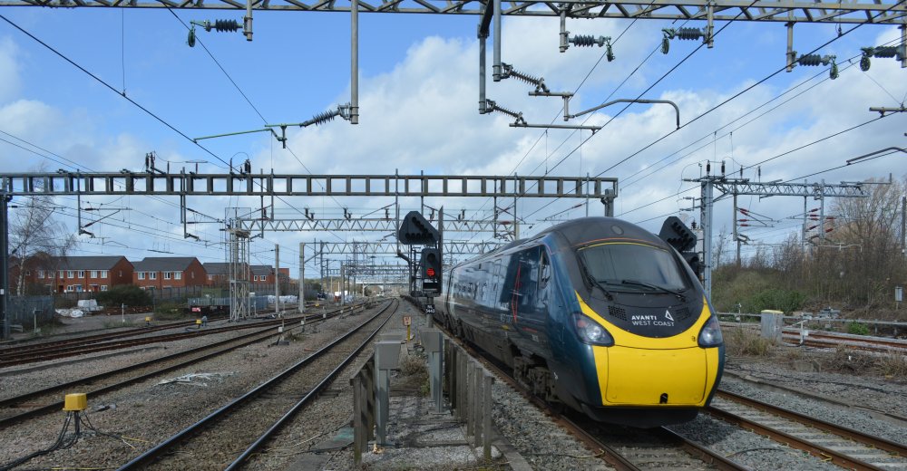 trainspotting a Class 390 express EMU unit at Nuneaton station with an Avanti West Coast train service from London Euston to Liverpool Lime street station