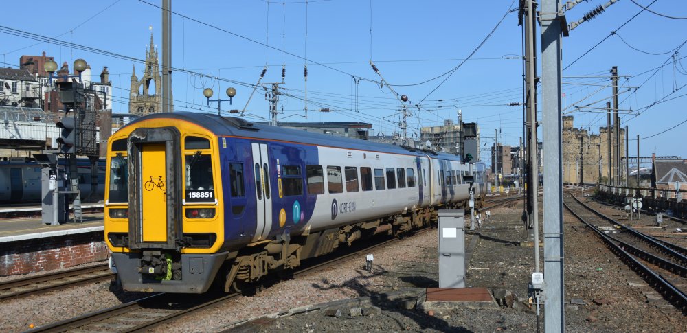 Class 158 DMU unit 158851 leaving Newcastle station with a Northern Rail local service to Morpeth (April 2023)