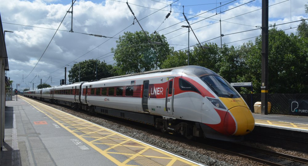 
Class 801 express EMU 9-car unit set 801222 speeds north through Northallerton station with an LNER-AZUMA service from London Kings Cross to Edinburgh Waverley station (July 2023)