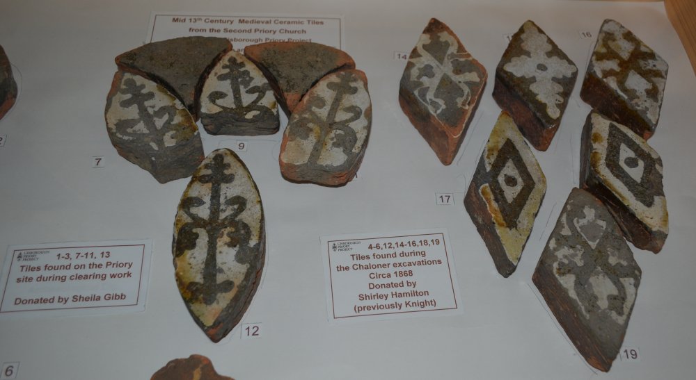 Some of the highly decorated medieval floor tiles recovered from excavations.
