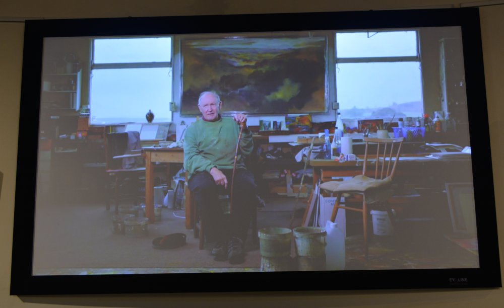 A still from the video about Peter and his work showing in the art gallery of the Dales Countryside Museum, Hawes, North Yorkshire painting by artist Peter M Hicks