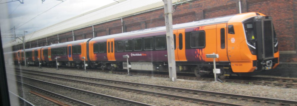 Class 730 EMU 3-car unit 730031 near Basford Hall (May 2024)in West Midlands Railway livery