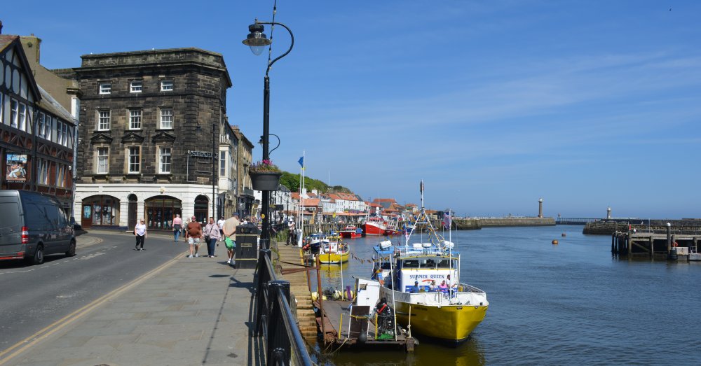 Looking towards the 18th Century Custom House on Old Market Square and harbour entrance, Whitby (May 2024)