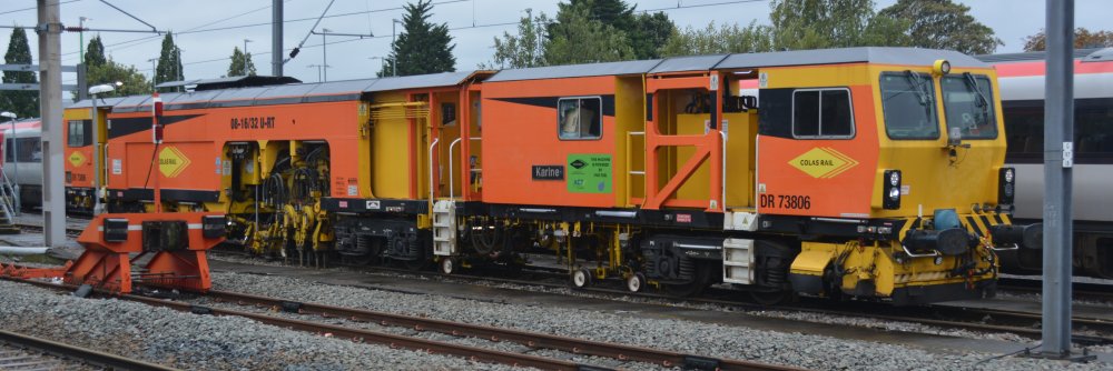 Colas Rail Plasser & Theurer plane line tamper track machine DR 73806 'This machine is powered by HVO fuel', which I gather is hydrotreated vegetable oil (Nuneaton station, 2024)