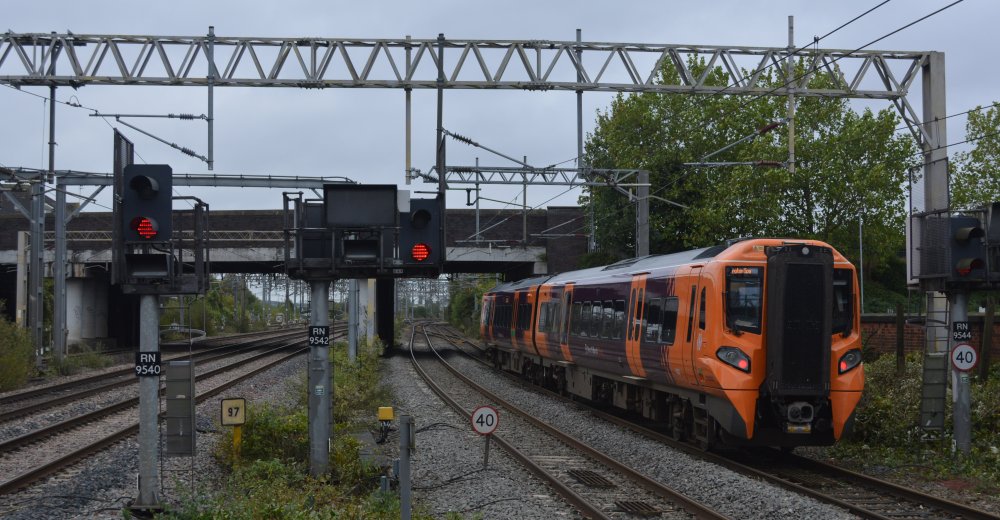 Class 196 DMU 196003 with a West Midlands Service from Leamington Spa entering Nuneaton station in 2024